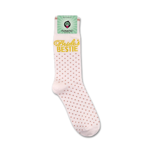 A pair of white socks with light pink polka dots and the words 