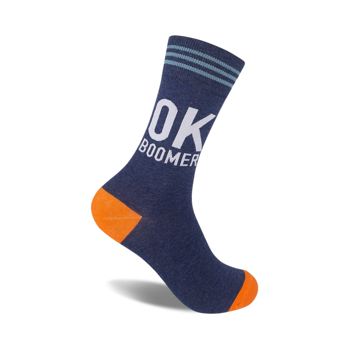 A navy blue crew sock with orange heel and toe. White 'OK BOOMER' text is prominently displayed.