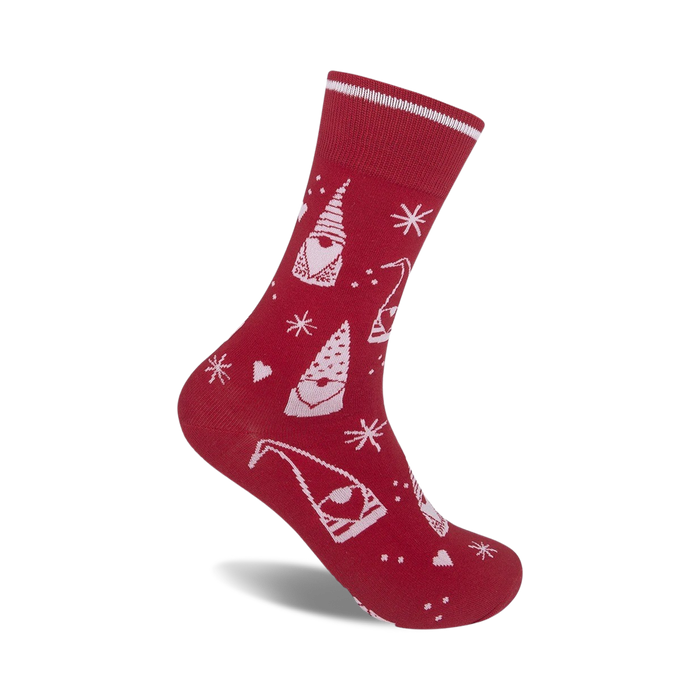 Red crew socks with a whimsical design. Features white gnomes, snowflakes, and hearts on a red background. Perfect for adding a touch of festive fun to any outfit! }}