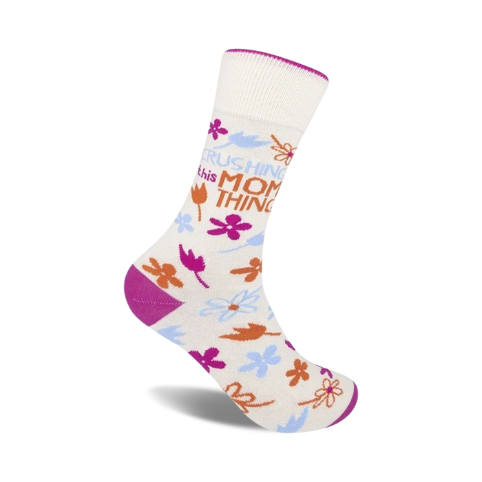 Cream crew socks with 'Crushing This Mom Thing' text, pink and orange flowers, and magenta heel and toe. }}