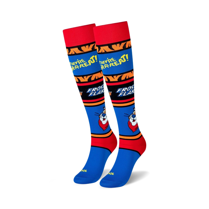Pair of knee-high socks in blue, red, and yellow. Features Tony the Tiger and 'They're Great!' Frosted Flakes branding.