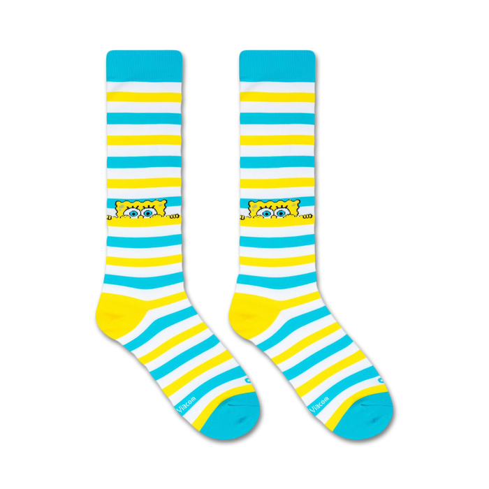A pair of blue and yellow striped socks with a picture of Spongebob Squarepants on each sock.