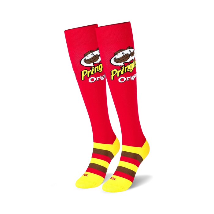Pair of red knee-high socks with yellow and brown stripes and the Pringles logo.