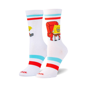 Pair of white crew socks with red and teal stripes. Spongebob Squarepants is featured lounging in a red armchair with a remote.