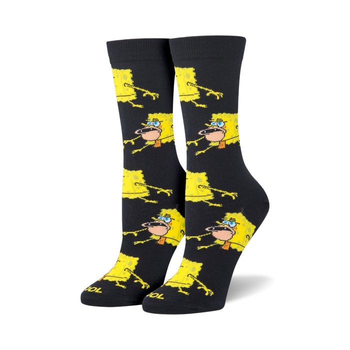 Pair of black crew socks featuring a repeating pattern of yellow Spongebob Squarepants in a prehistoric pose.
