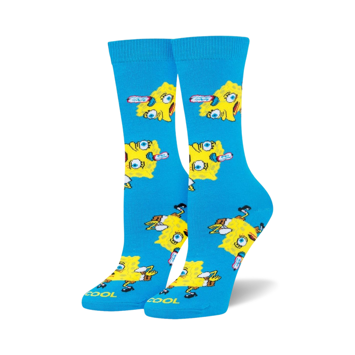Pair of crew socks, bright blue with repeating pattern of SpongeBob Squarepants meme faces in yellow.