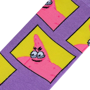 Close-up detail shot highlighting the quirky design of Patrick Star's face within yellow squares on the purple sock.