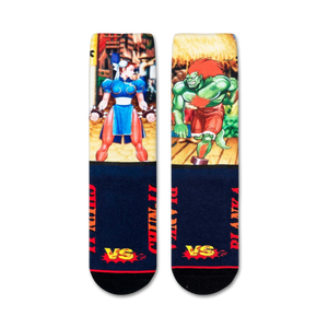 Flatlay showcasing the Street Fighter Chun-Li vs. Blanka crew socks, highlighting the full design.
