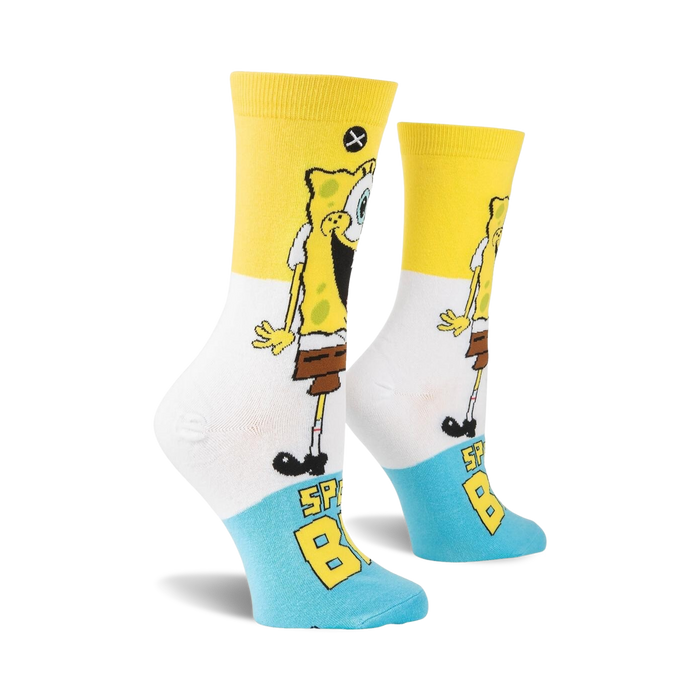 Lifestyle shot of Spongebob Squarepants Smilepants socks on a model's feet.