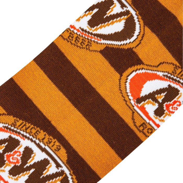 Close-up detail shot highlighting the A&W logo and striped knit texture of the socks.