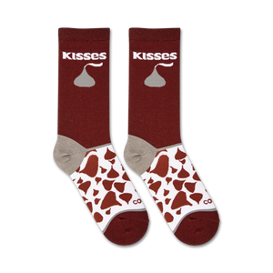 Flatlay product shot of two pairs of Hershey's Kisses socks. The socks are maroon with a white and brown Kisses pattern.