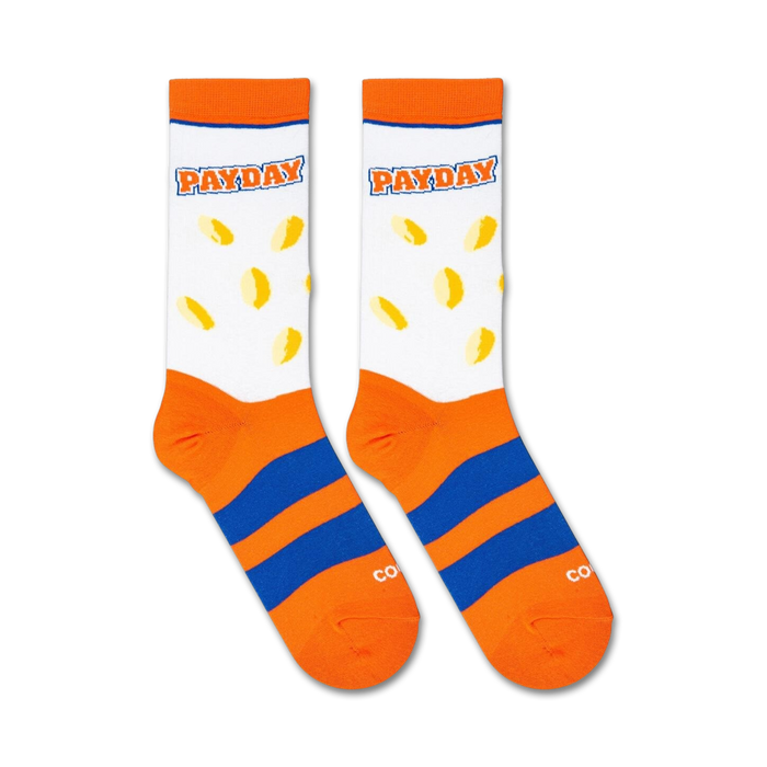 A pair of orange and white socks with the word 