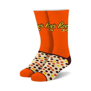 orange crew socks with brown polka dots and heel/toe. inspired by reese's pieces candy.  