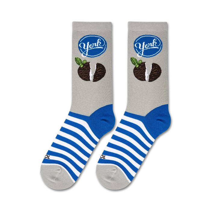 Flatlay showcasing a pair of York Peppermint Pattie socks, highlighting the design and blue and white stripes.