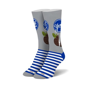 Pair of crew socks in grey and blue.  The socks feature a York Peppermint Pattie design with the brand logo and a peppermint pattie graphic.