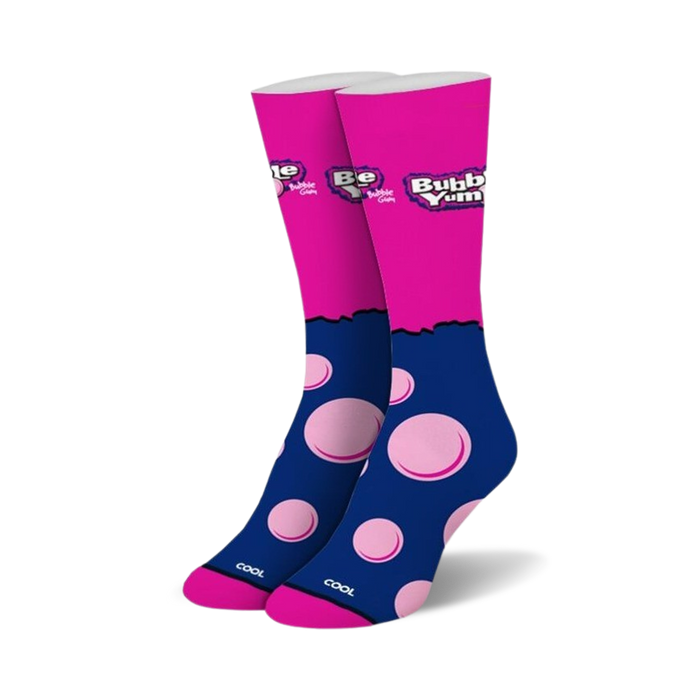 Pair of crew socks in pink and navy blue.  The socks feature a Bubble Yum logo and pink bubblegum-shaped designs.