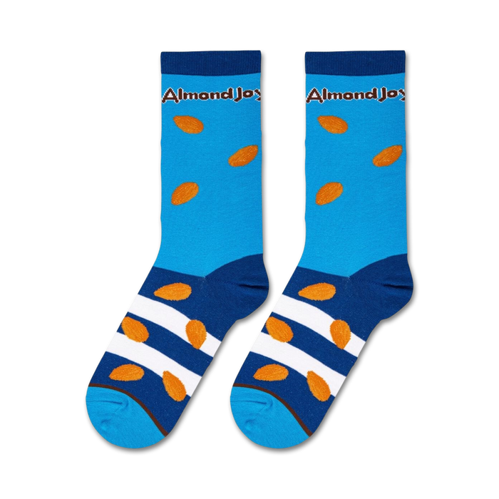 A pair of blue socks with a white and brown striped pattern around the ankle and brown almond-shaped objects all over. The word 