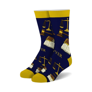 Pair of navy blue crew socks featuring gold scales of justice, gavels, and open books. The word 'Lawyer' is subtly incorporated into the design.