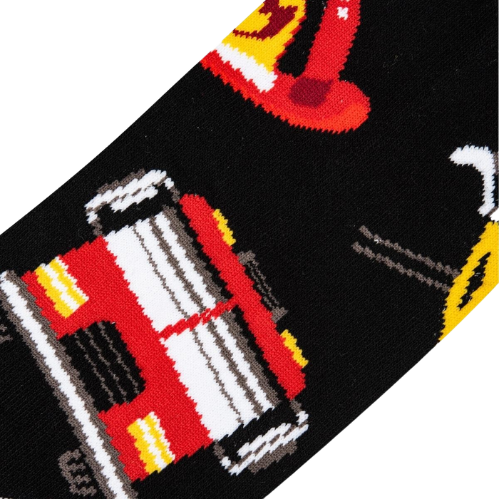 Close-up detail shot of the Firefighter sock design, emphasizing the firetruck illustration.