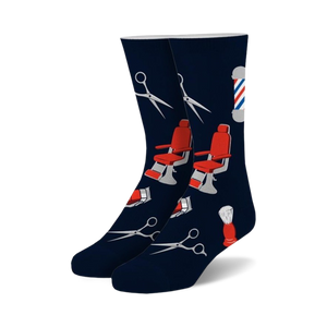 Pair of navy blue crew socks with red and gray barber-themed designs: barber chairs, scissors, and shaving brushes.