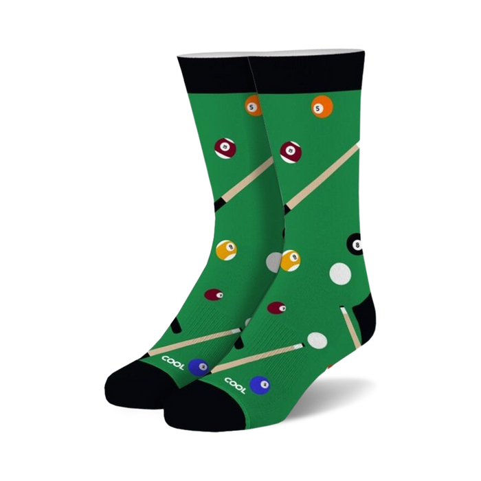 Pair of crew socks with a green pool table design. Features billiard balls in various colors and cues. Black cuff.
