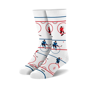 Pair of white crew socks with a hockey rink design.  Red, blue, and black hockey players are depicted skating on the rink.