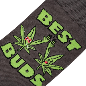 Close-up detail shot of the 'Best Buds' sock design, highlighting the cartoon marijuana leaves and text.