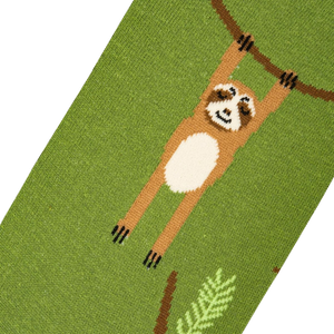 Close-up detail shot of a sloth on the sock, highlighting the knit texture.