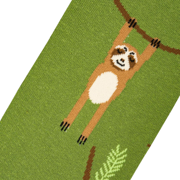 Close-up detail shot of a sloth on the sock, highlighting the knit texture.
