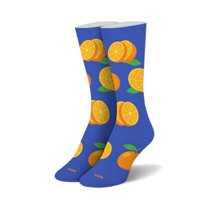 Pair of crew socks; blue background with orange slices and whole oranges.  Fun, casual style.