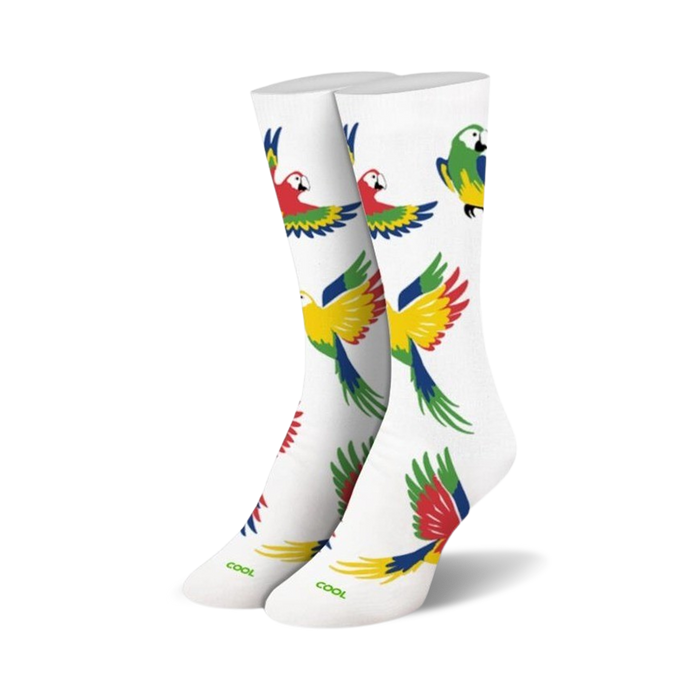 Pair of white crew socks with a colorful parrot design.  Red, yellow, green, and blue parrots are scattered across the socks.