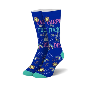 Pair of crew socks in blue featuring a 'Carpe the Fuck out of this Diem' slogan, rainbows, suns, and stars.