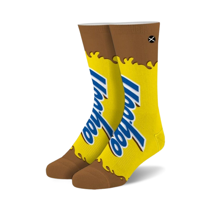 Pair of crew socks in yellow and brown. The socks feature a YooHoo chocolate drink design, with the logo prominently displayed. }}