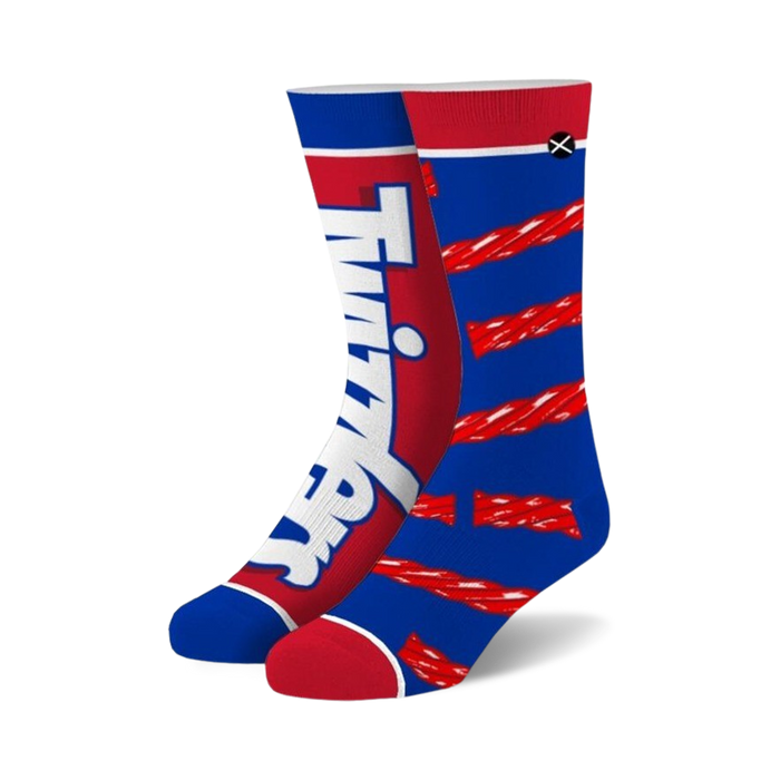 A pair of crew socks. One features the Twizzlers logo on a red background. The other shows red Twizzlers on a blue background. Both socks feature white accents. }}