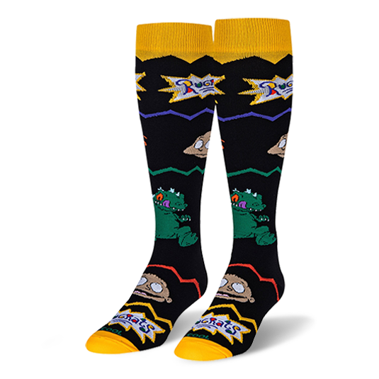 Black knee-high socks with yellow cuffs and toes, featuring the Rugrats logo, Tommy, Reptar, and colorful zig-zag lines.