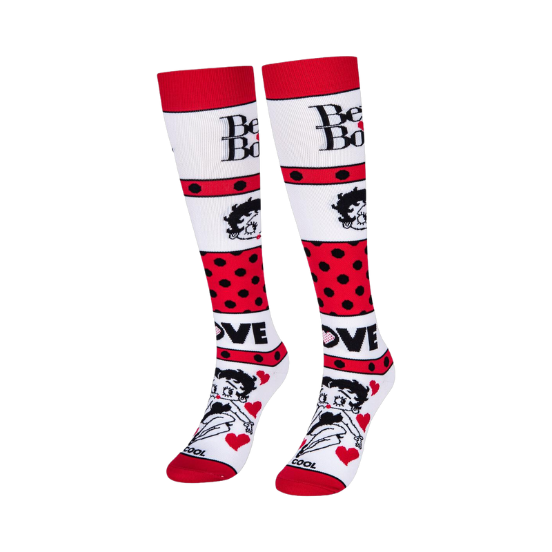White knee-high socks featuring Betty Boop text, her face, bold red polka dot stripes, and the word LOVE with red hearts.