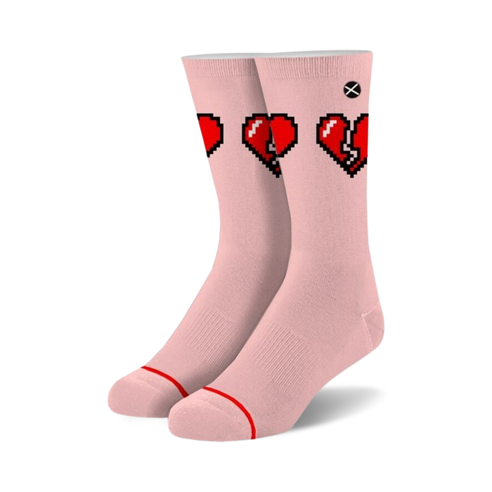 pixelated red broken hearts on pink crew socks. for men and women.    }}