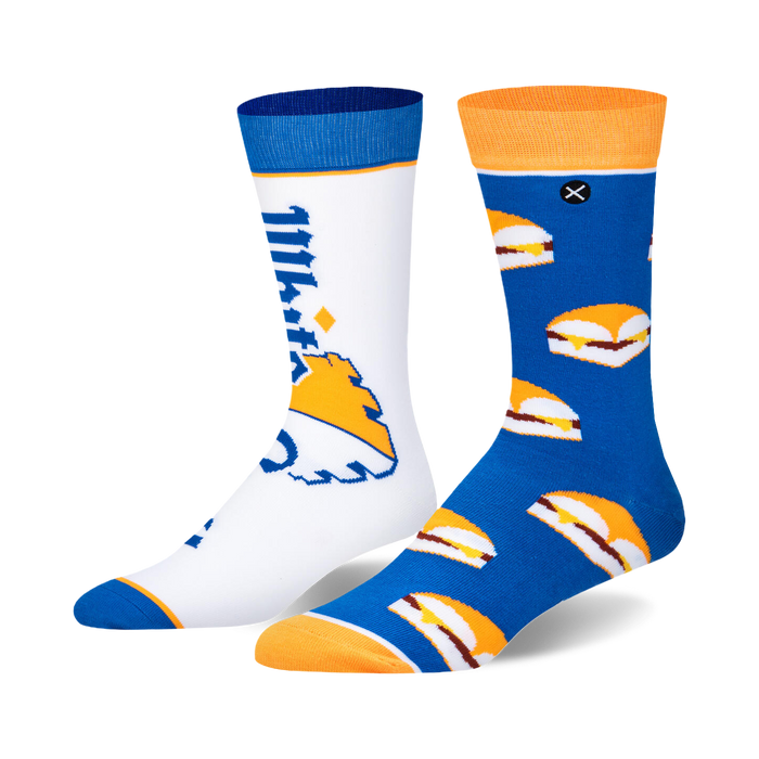 Pair of crew socks; one white with White Castle logo, the other blue with White Castle slider pattern. Orange and blue cuffs.