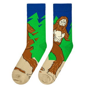 Lifestyle photo showing the Sasquatch socks on a person's feet, highlighting the sock's fit and design.