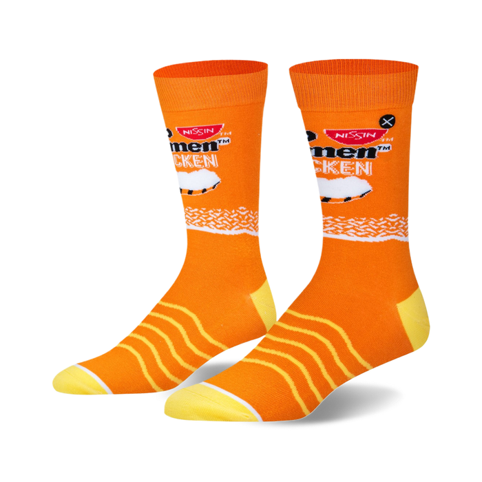 A pair of orange crew socks with a Top Ramen Chicken design. Yellow stripes accent the orange background, and a small chicken graphic is featured. }}