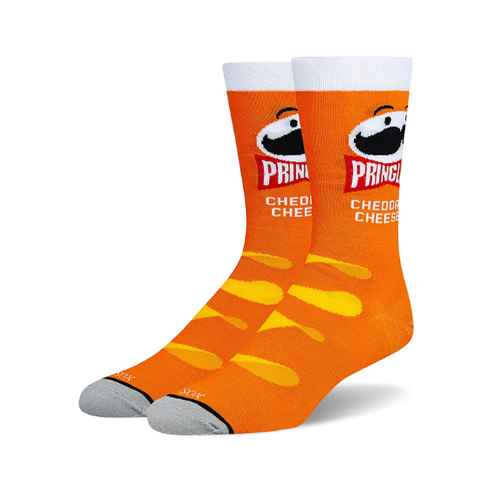 Pair of orange crew socks with a Pringles Cheddar Cheese design. Features the Pringles can and cheesy chip pattern. }}