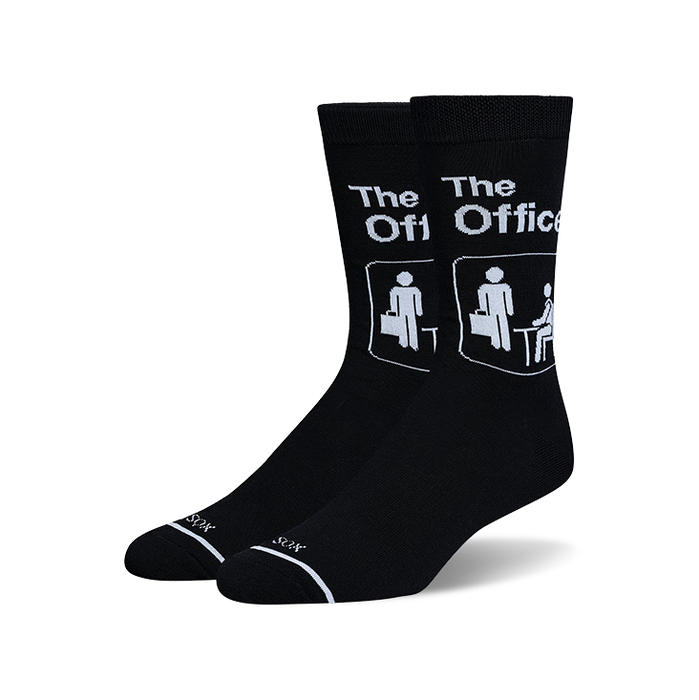 Pair of black crew socks with The Office logo and iconic office worker pictogram.