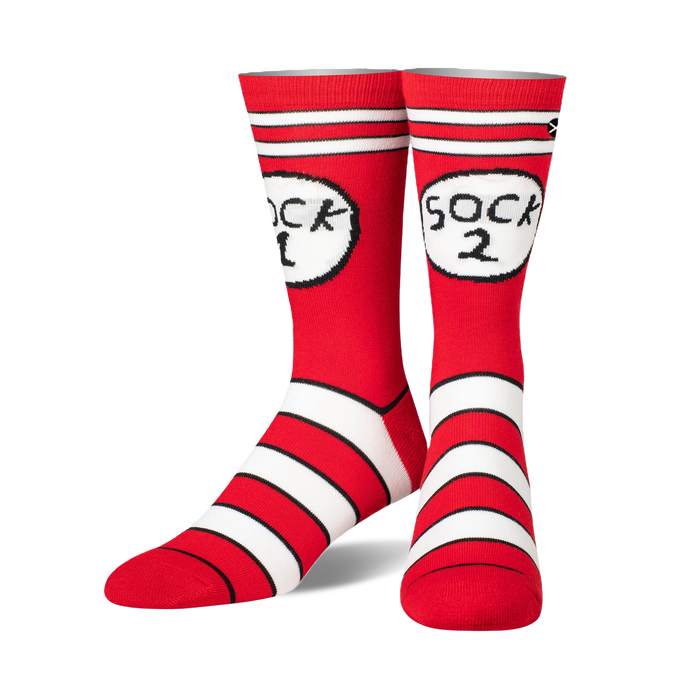Pair of red and white crew socks with 'Sock 1' and 'Sock 2' in Cat in the Hat-inspired graphics. Features bold stripes near the ankle. }}