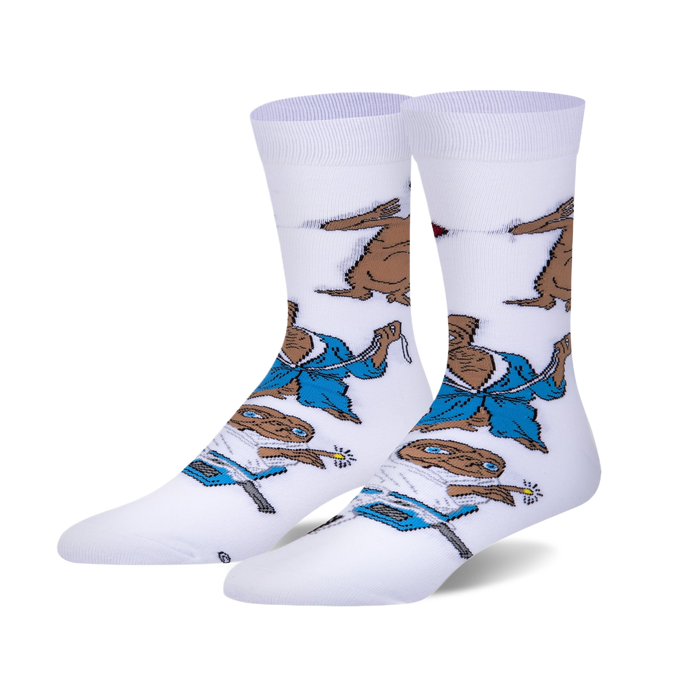 Pair of white crew socks with an all-over print of E.T. in a blue robe and other scenes from the movie. }}