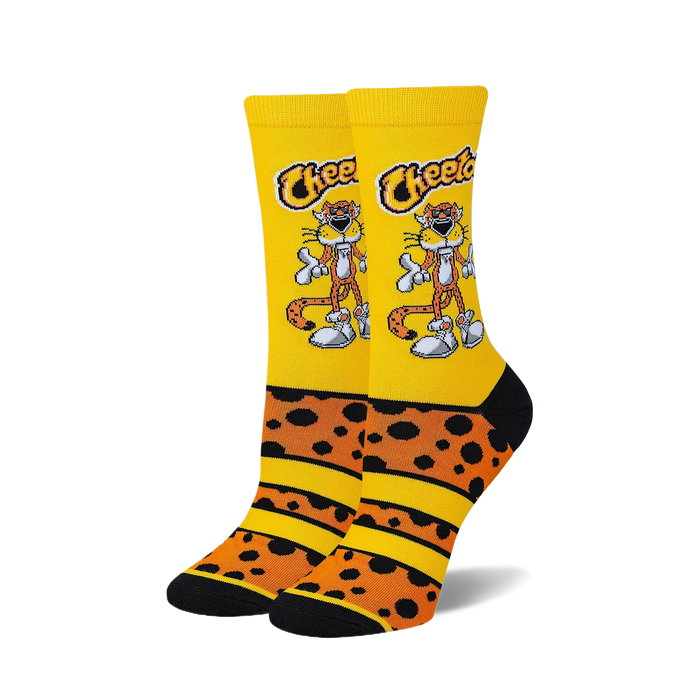 Pair of crew socks; yellow base with orange and black cheetah spots. Chester Cheetah cartoon character is prominently featured. }}
