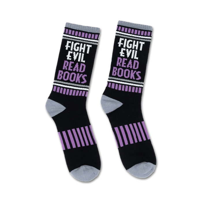 Pair of black crew socks with purple stripes and the text 'Fight Evil, Read Books'. }}
