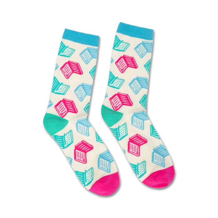 Pair of crew socks with a white background and teal and pink open book designs. The socks have light blue cuffs and hot pink heels and toes. }}