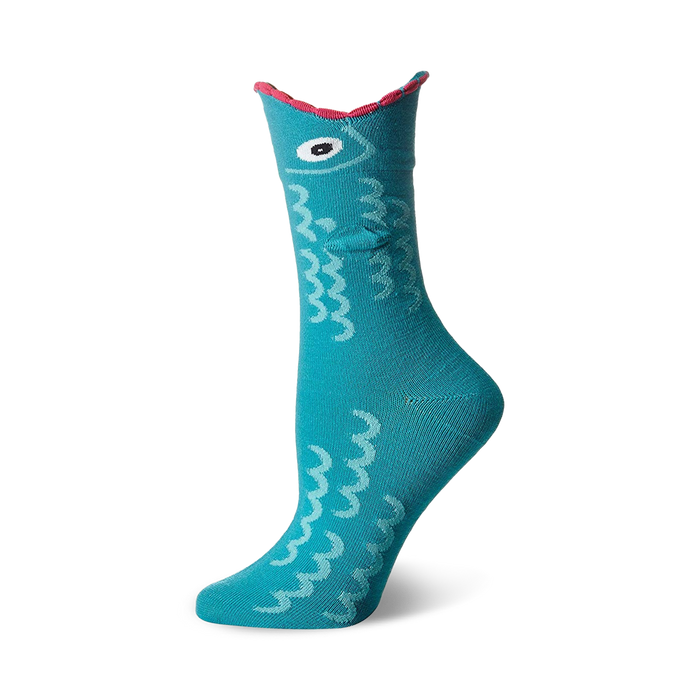 Teal crew socks with a whimsical fish design. The fish has a single eye and wavy body pattern. Pink detailing at the top. }}