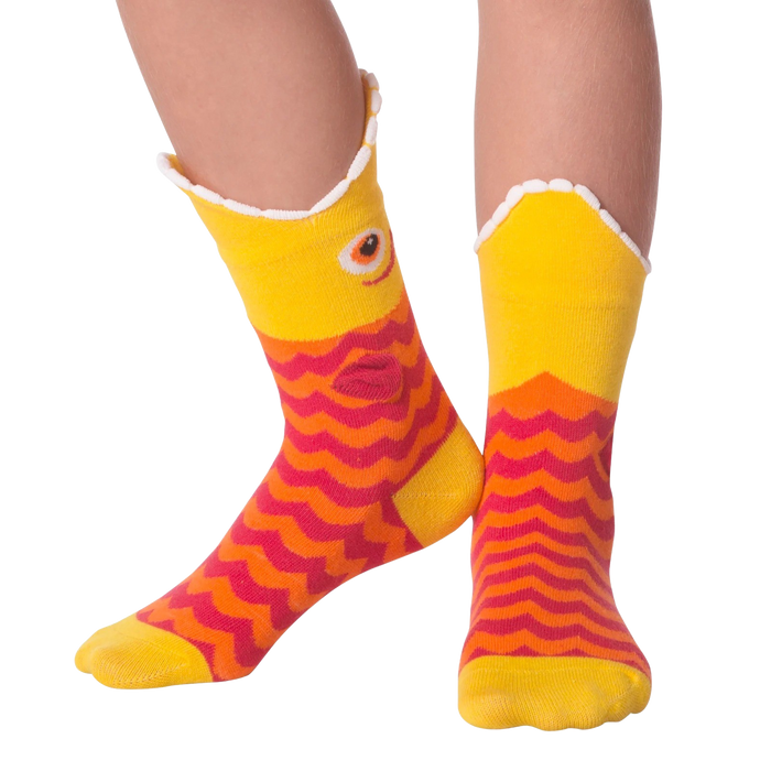 A pair of yellow socks with a fish-shaped top and red and orange wave-patterned body.