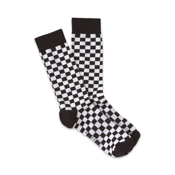 Pair of black and white checkerboard crew socks. Classic design, comfortable fit. }}
